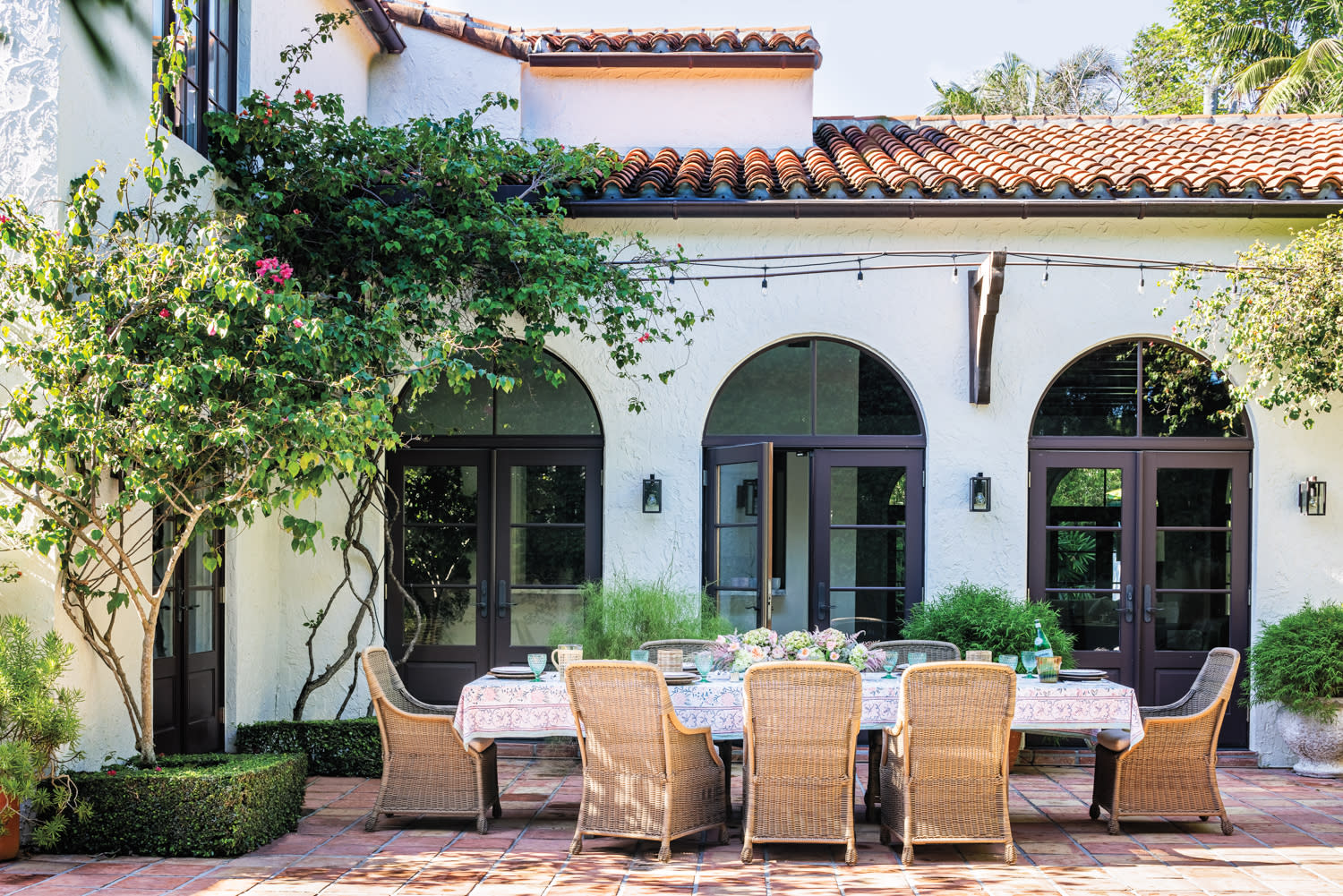 designer Constanza Collarte backyard with outdoor dining table