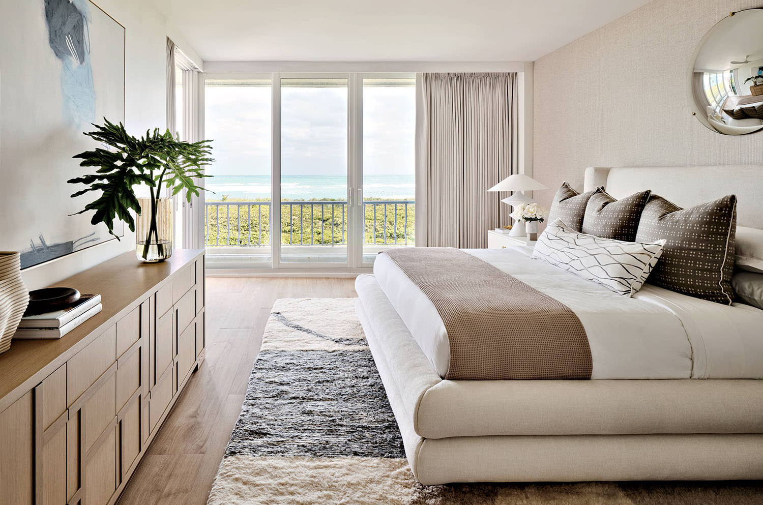 contemporary coastal bedroom in a modern South Florida home