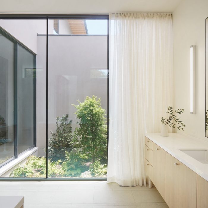 Designer Jean Liu worked with Smitharc Architects to create this minimalistic Dallas oasis, which includes Caesarstone counters, a Graff faucet, a sink by Kohler and Artemide lighting.