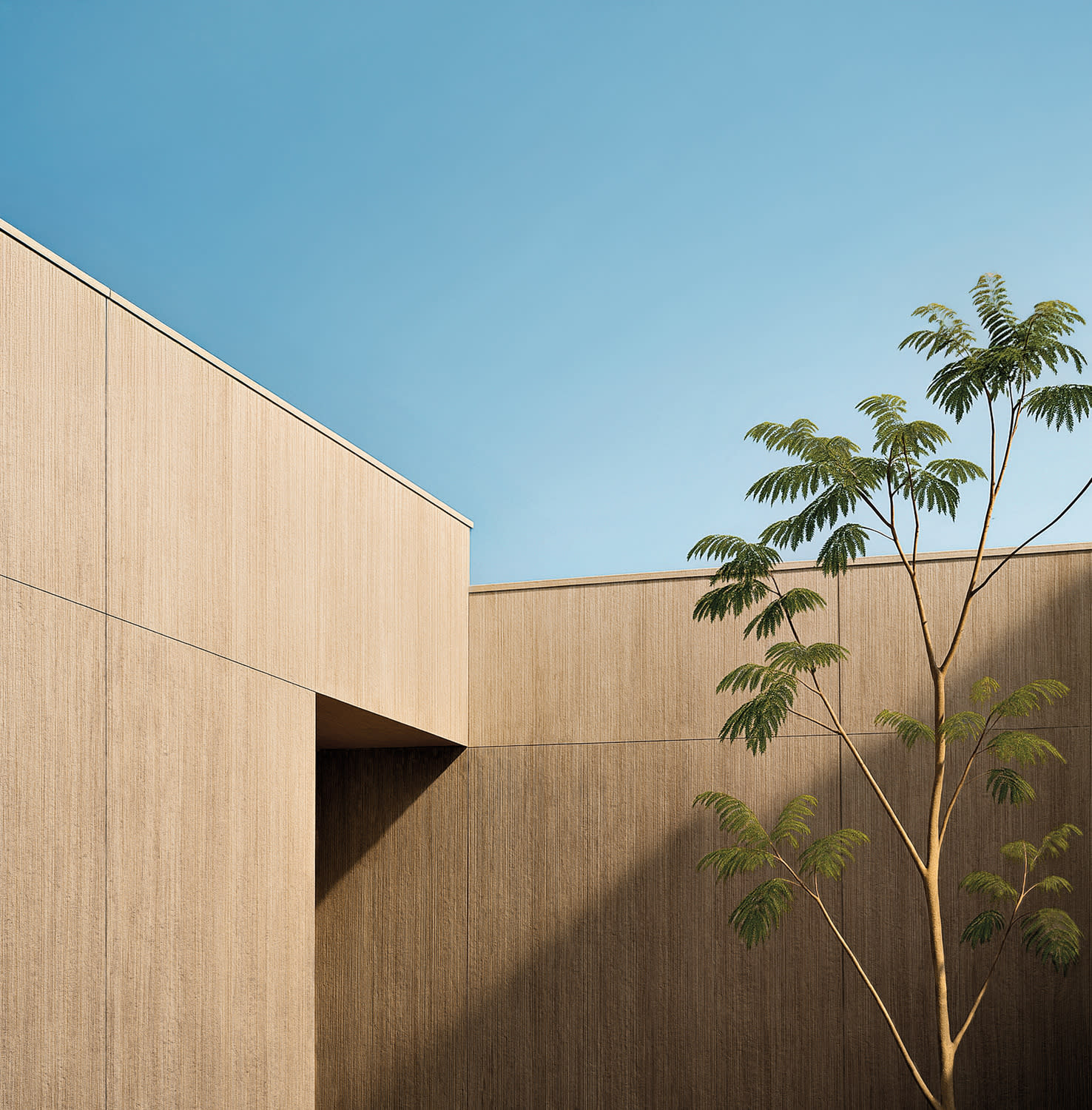 A tree stands in front of a building featuring Neolith's new Architectural line of nature-inspired wall surfaces