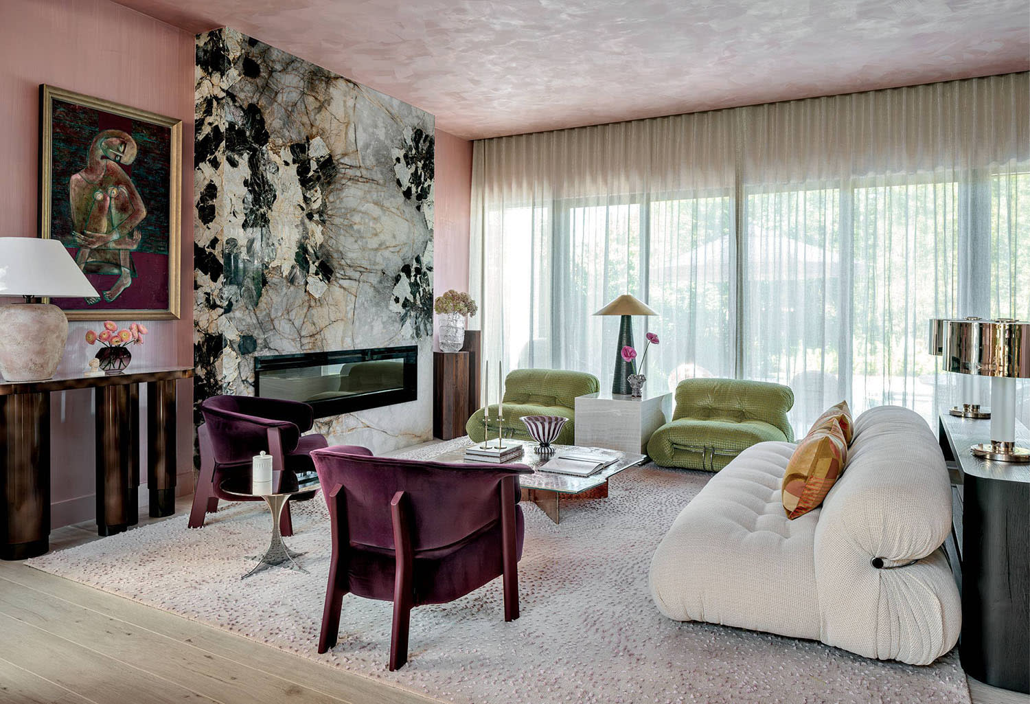 pink living room with a grand onyx fireplace