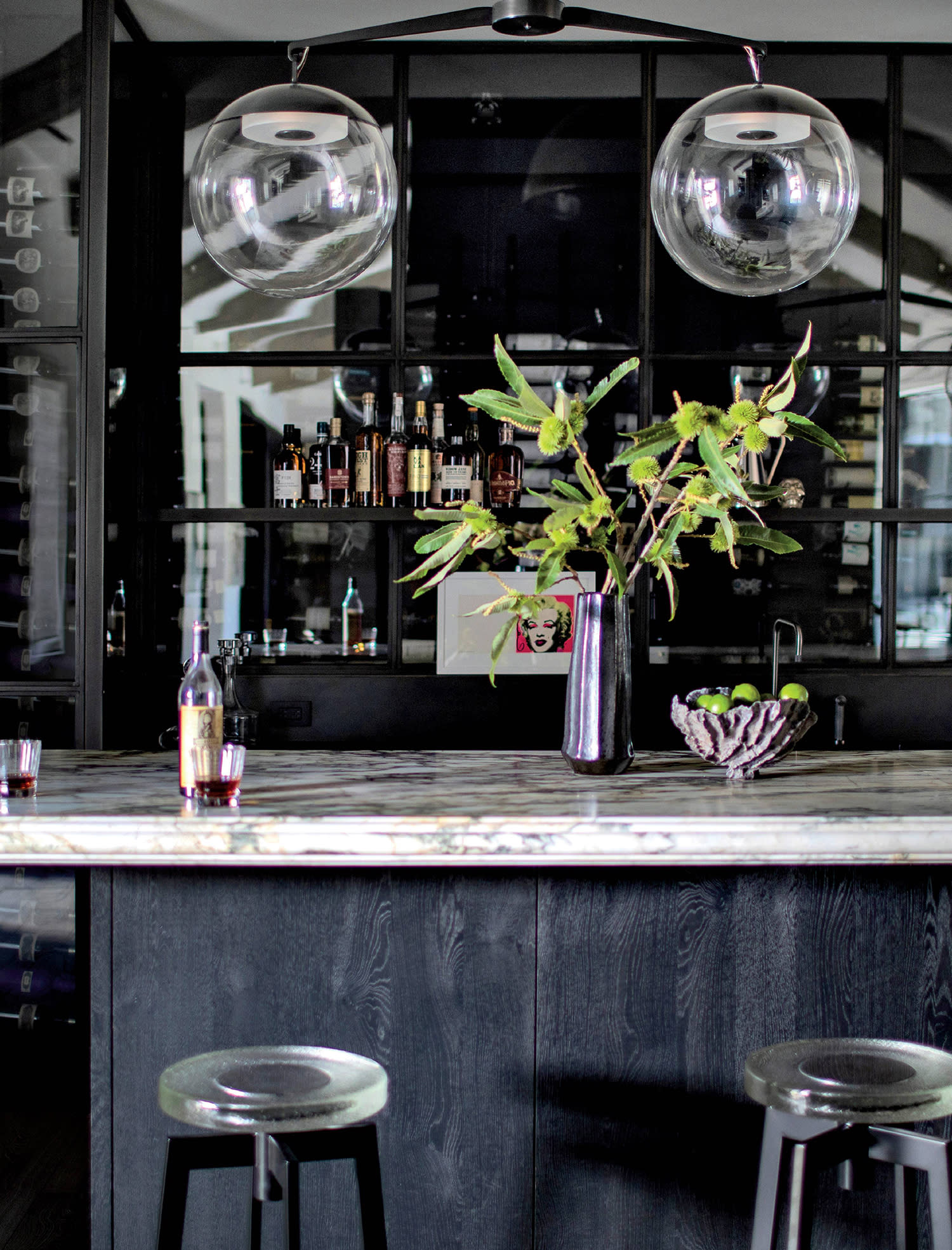 black and white home bar with a moody, contemporary aesthetic