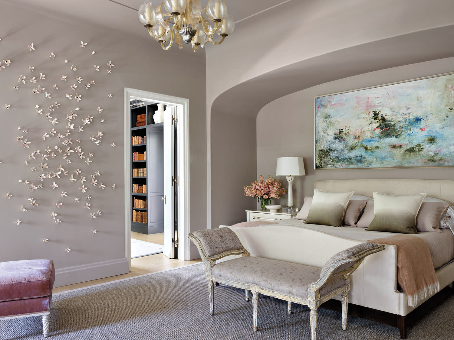 contemporary elegant bedroom with a ceramic floral installation on one wall
