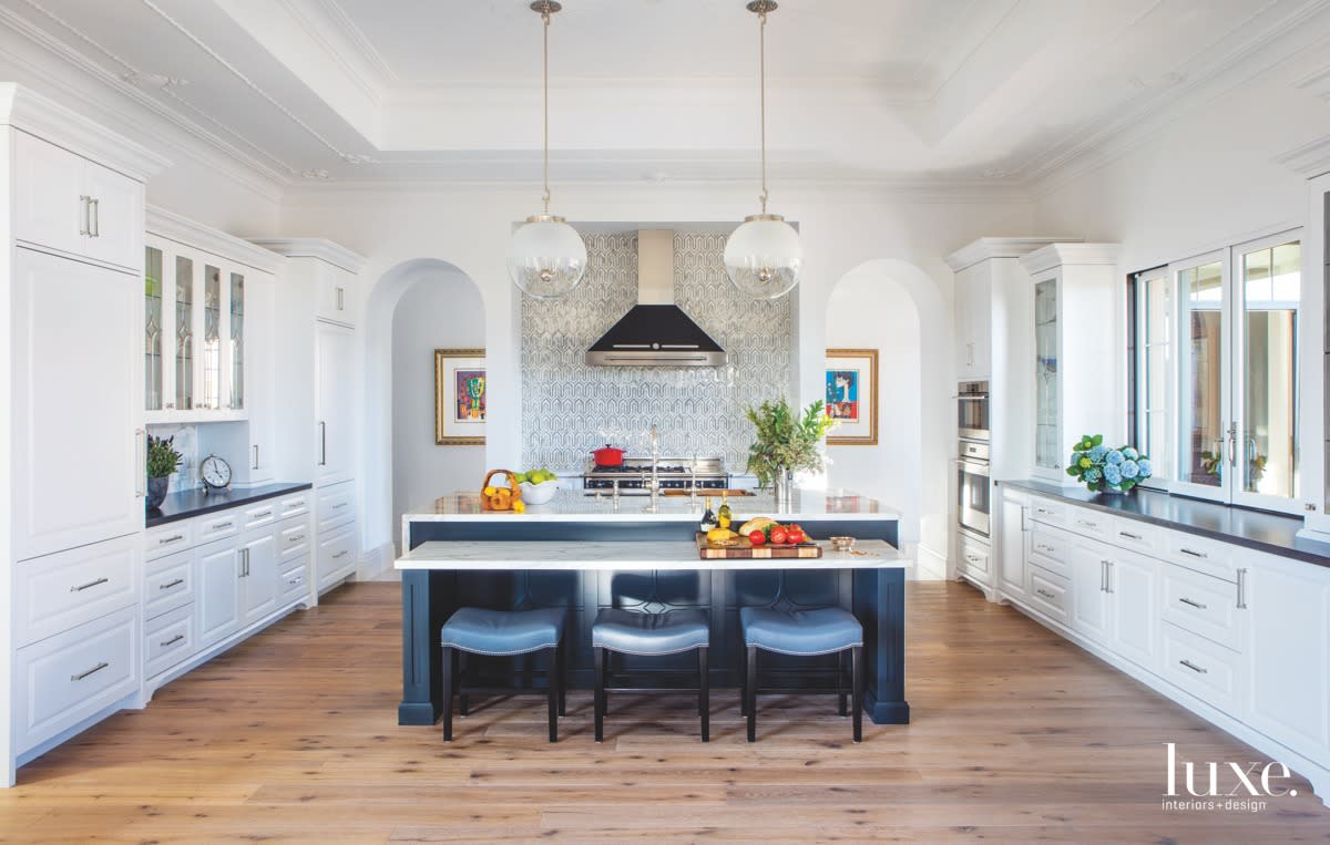 transitional kitchen blue island white cabinetry