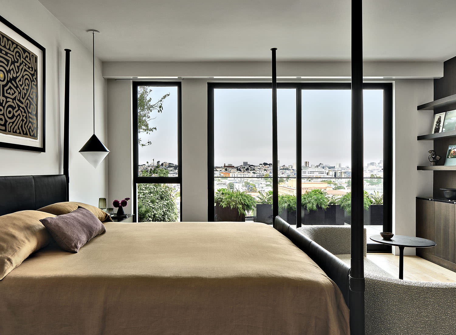 contemporary bedroom with San Francisco city views out the large windows
