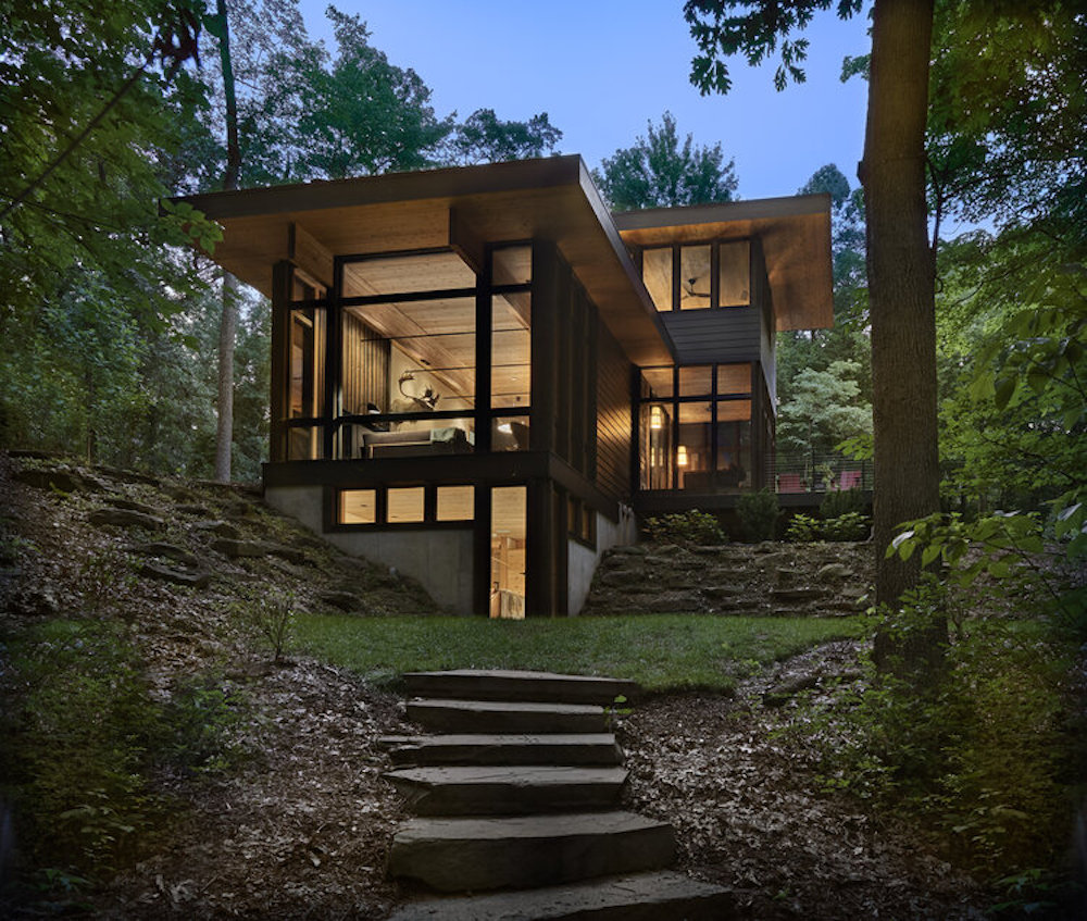 Exterior view of home surrounded by trees