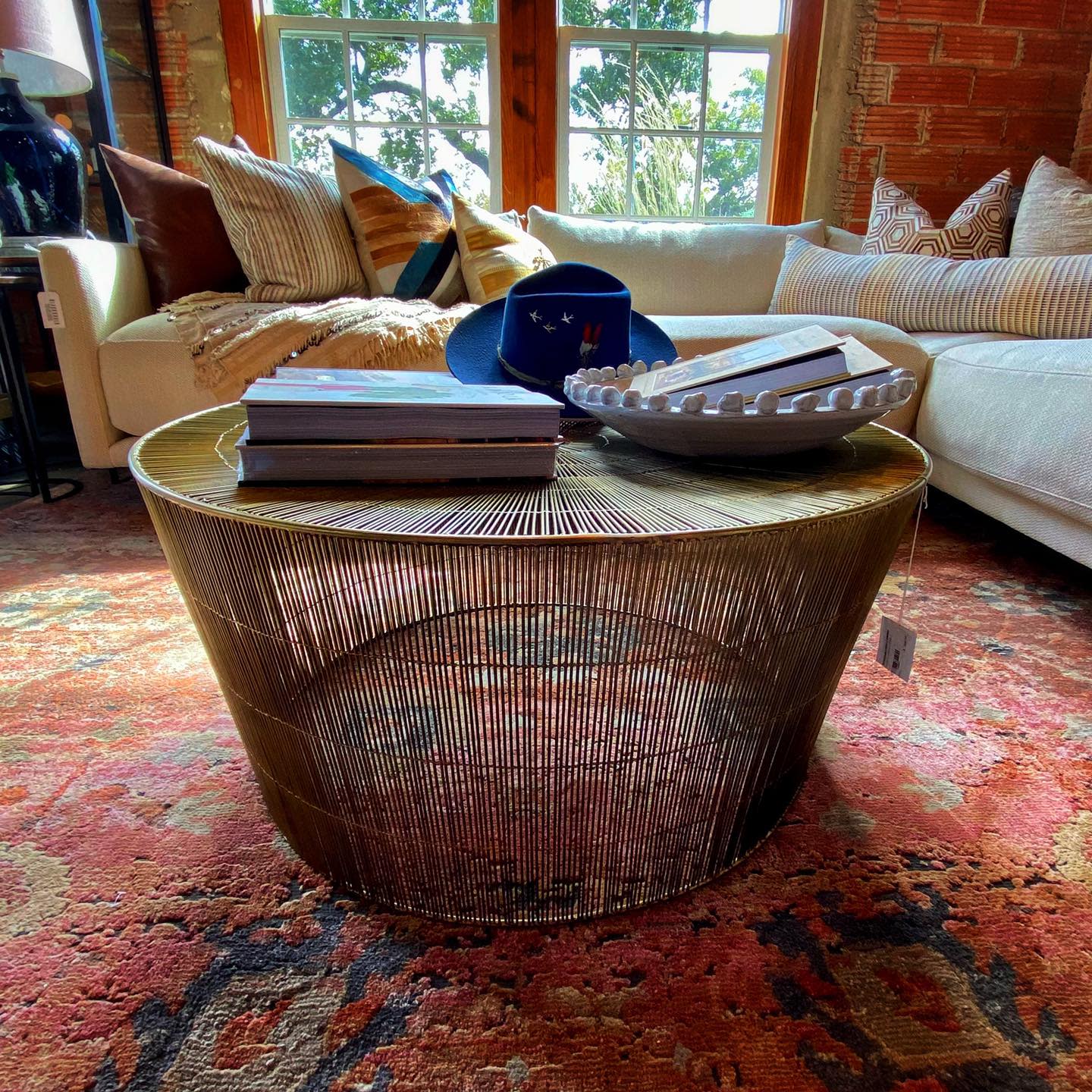 Coffee table with red Moroccan rug create a warm space.