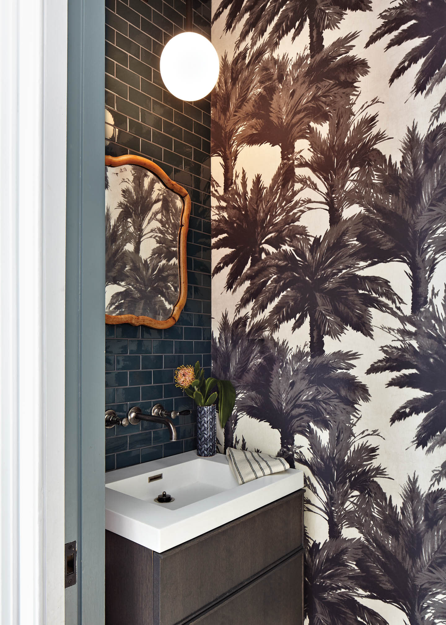 Pierre Frey bathroom wallpaper in a small powder room