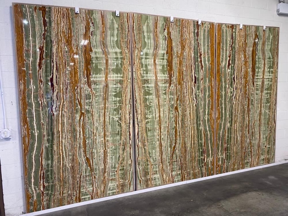 Slabs of natural stone such as granite, marble, quartzite, and onyx at Elements Room