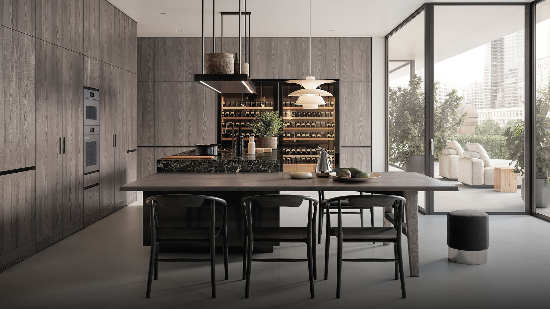 A kitchen with a table and chairs, providing a cozy space for dining and gathering.