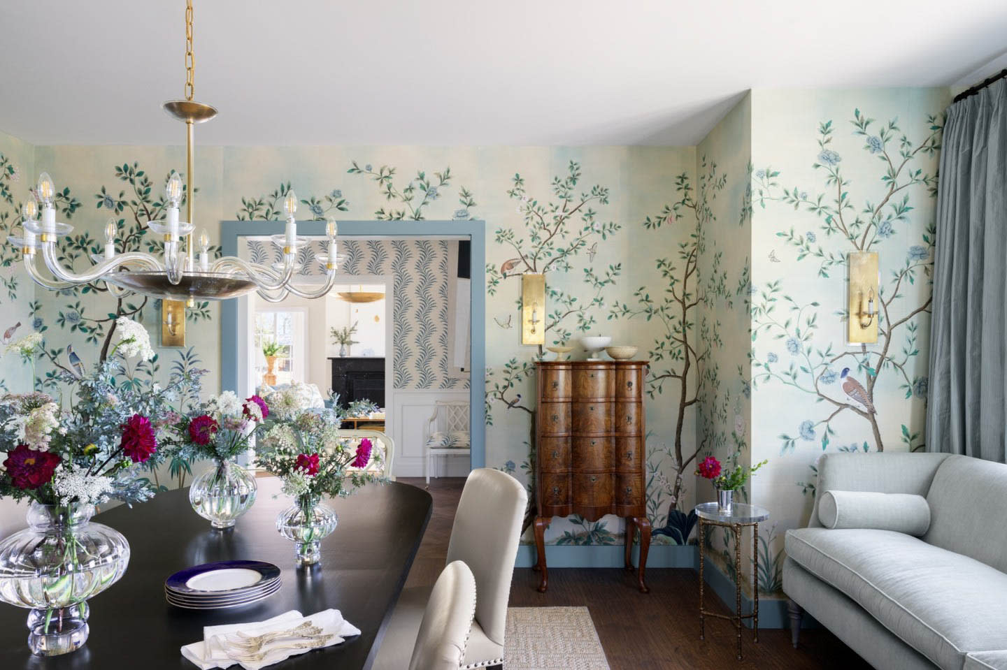 classic dining room with a De Gournay Nordic Garden wallcovering 