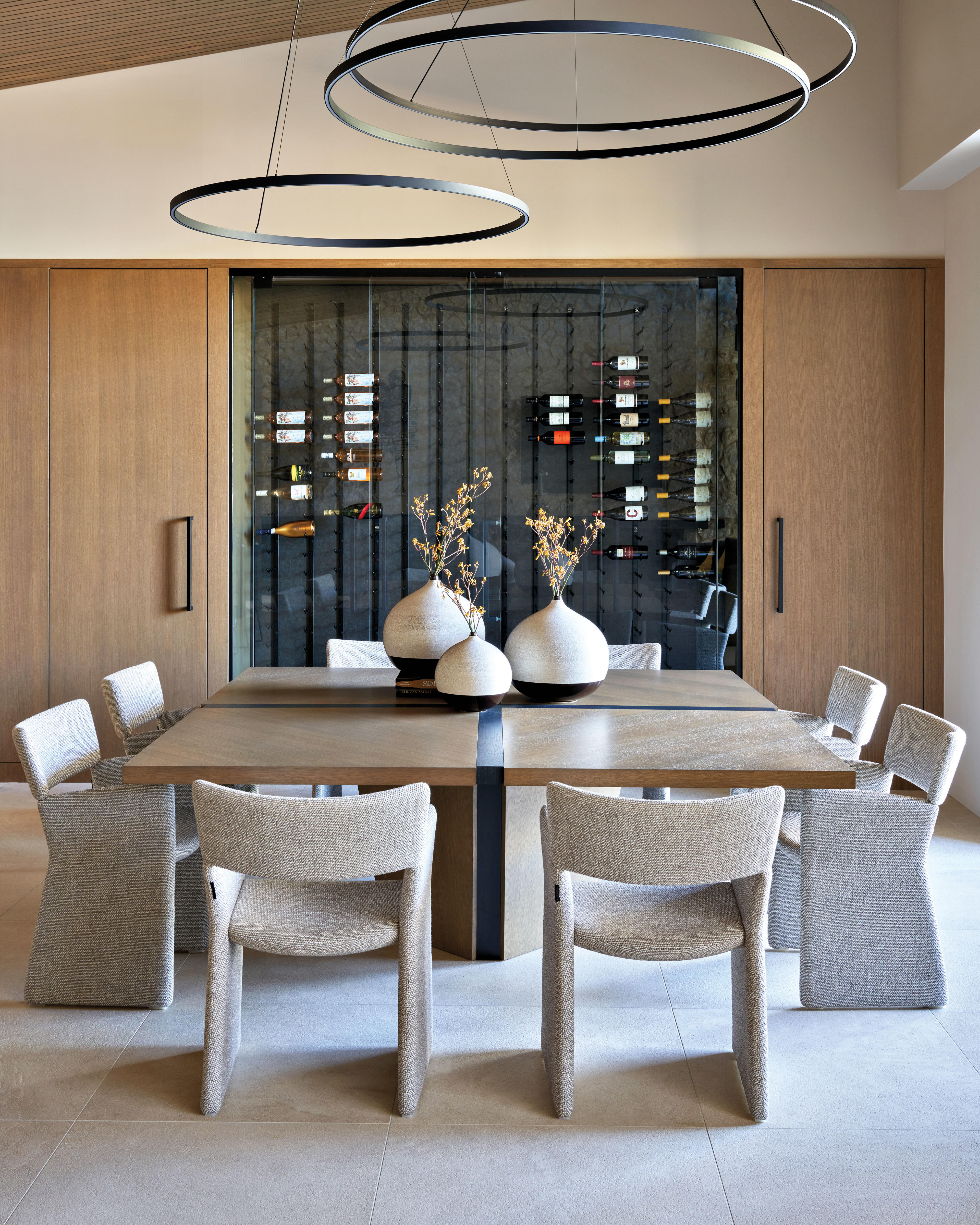 sophisticated dining area with wine storage in the back