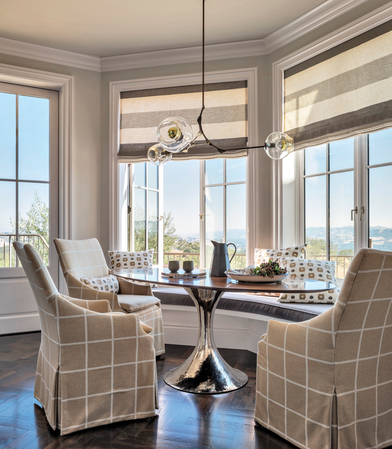 warm neutral breakfast nook with open windows