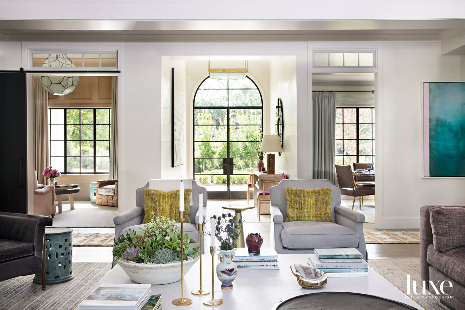 living room with matching chairs and a large coffee table