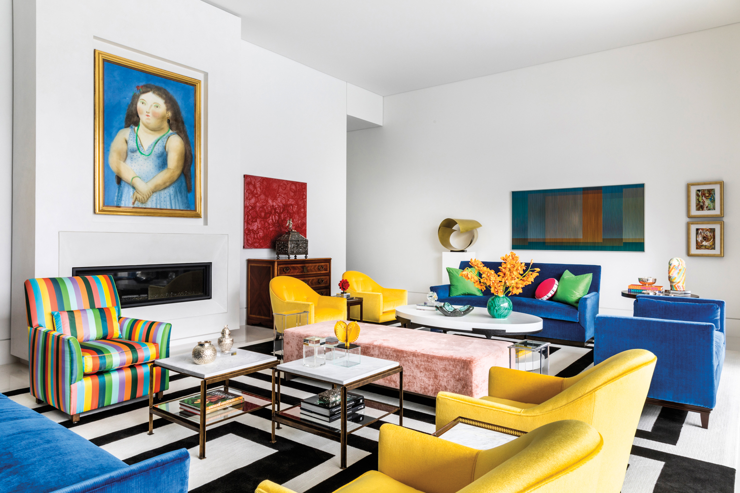 living room featuring bold colorful furnishings and notable art