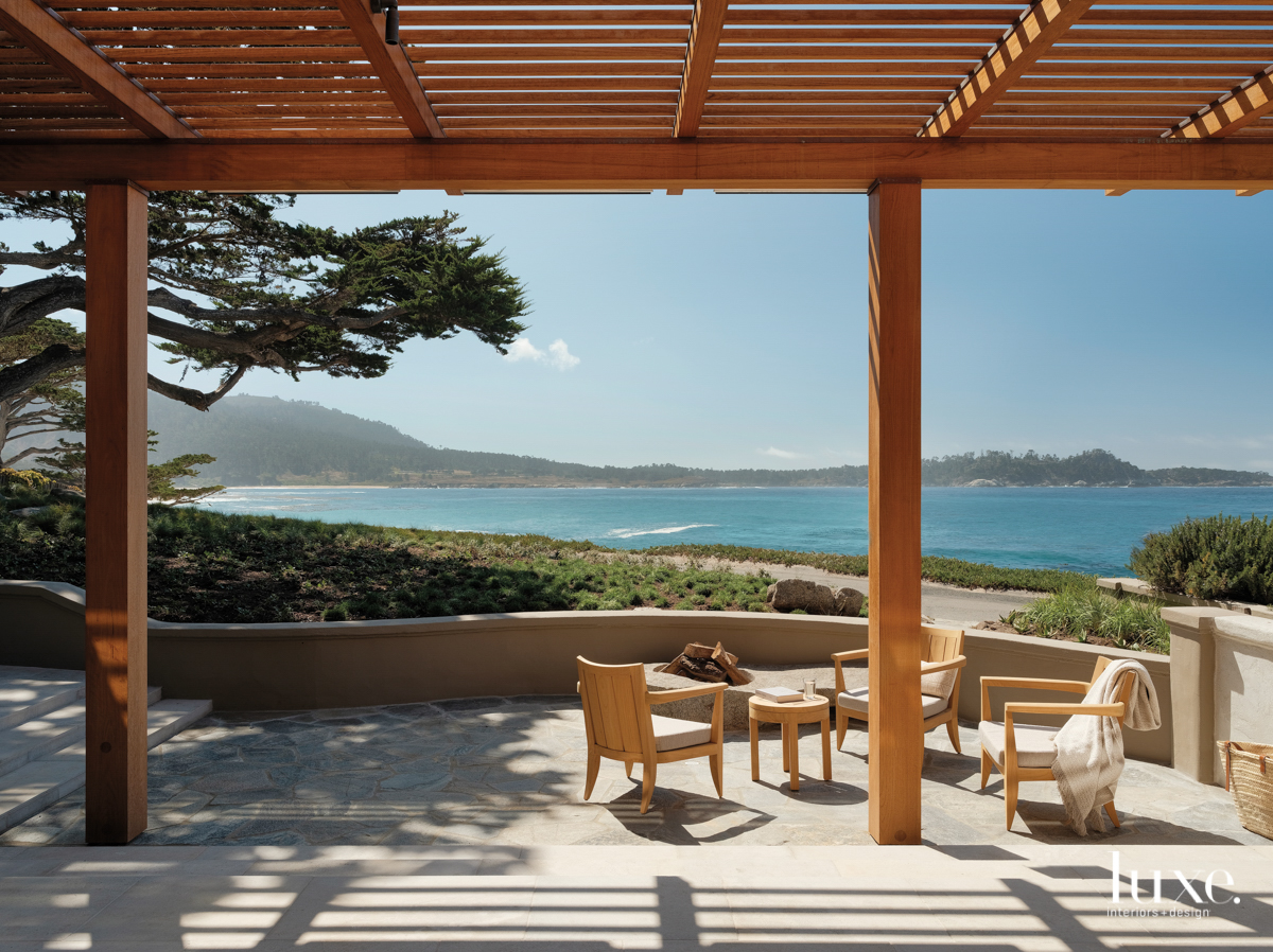 A back patio looks over the water.