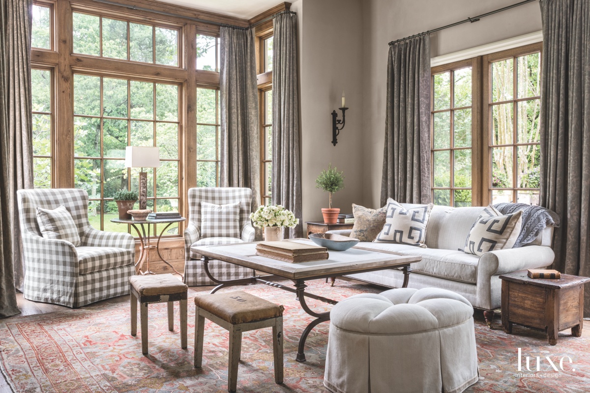 traditional living room antique rug checkered chairs