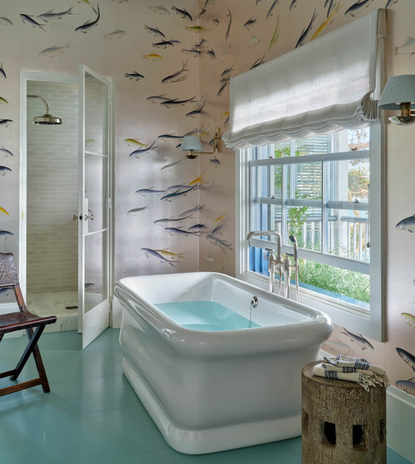 bathroom with fish-themed wallpaper
