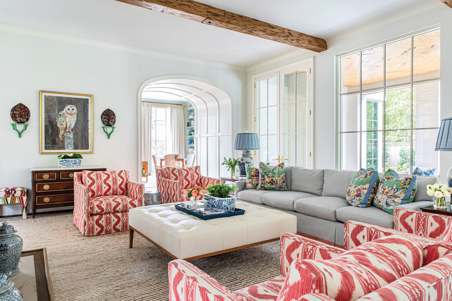 sunny living room with vibrant patterns and colors in home by Kristen Woolery