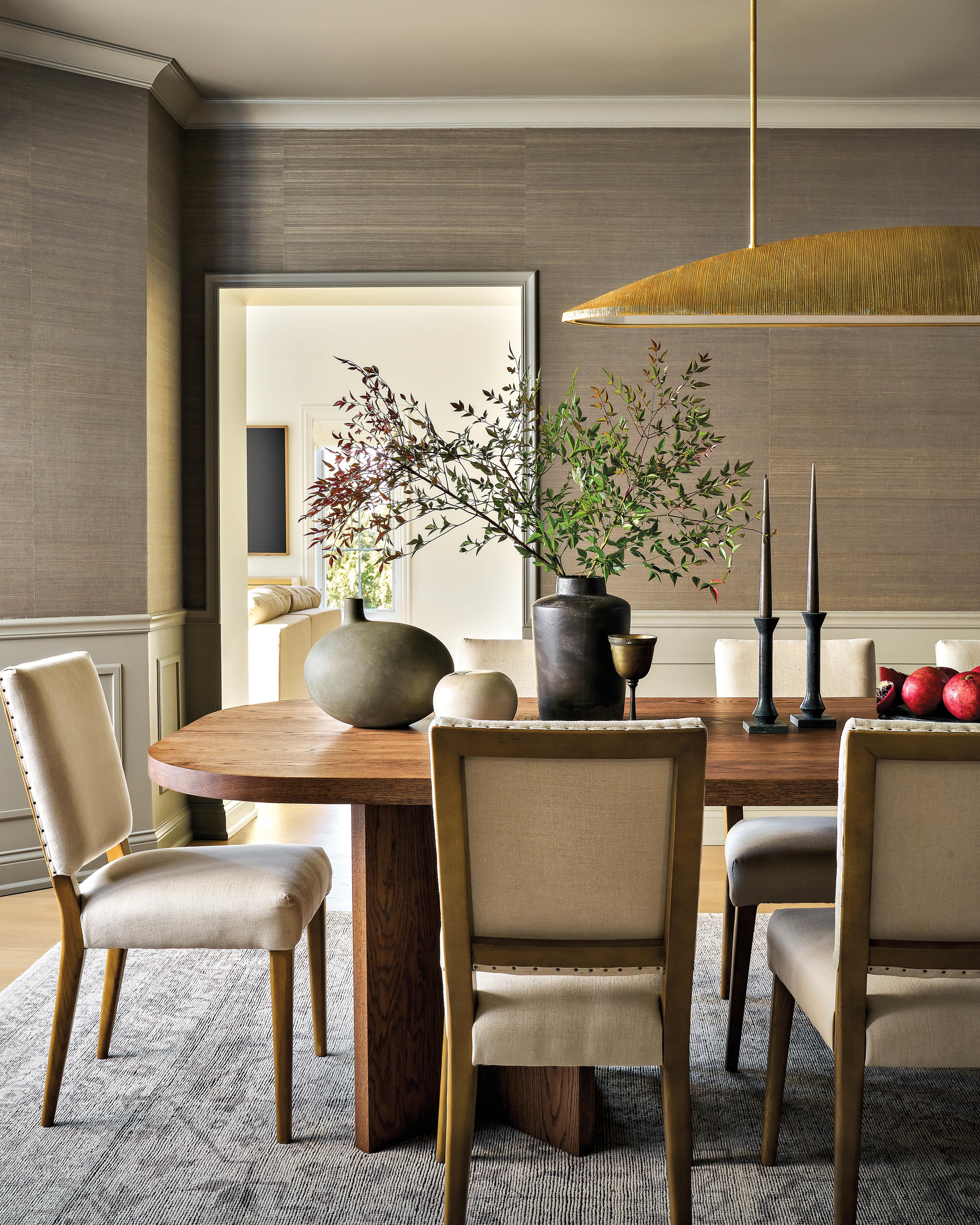 organic modern dining room with greenish-gray grasscloth wallcovering