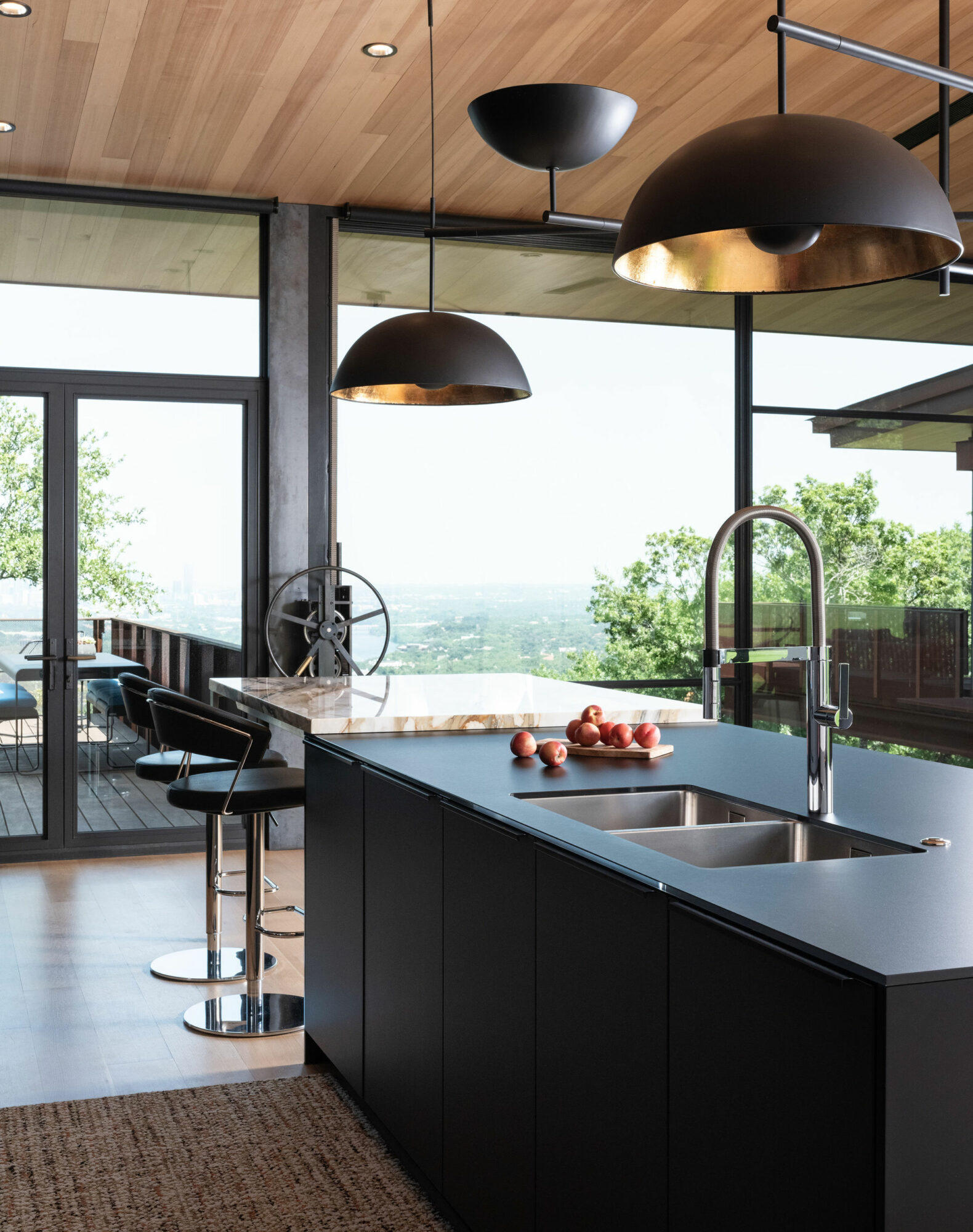 A kitchen with a sink and counter, providing a functional space for cooking and cleaning.