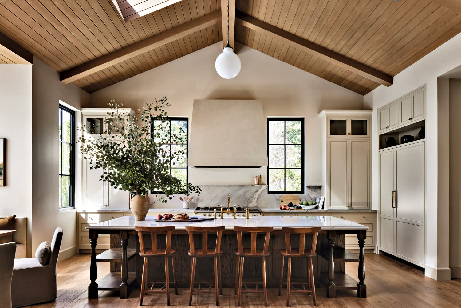 open-concept kitchen with white Mediterranean quartzite countertops