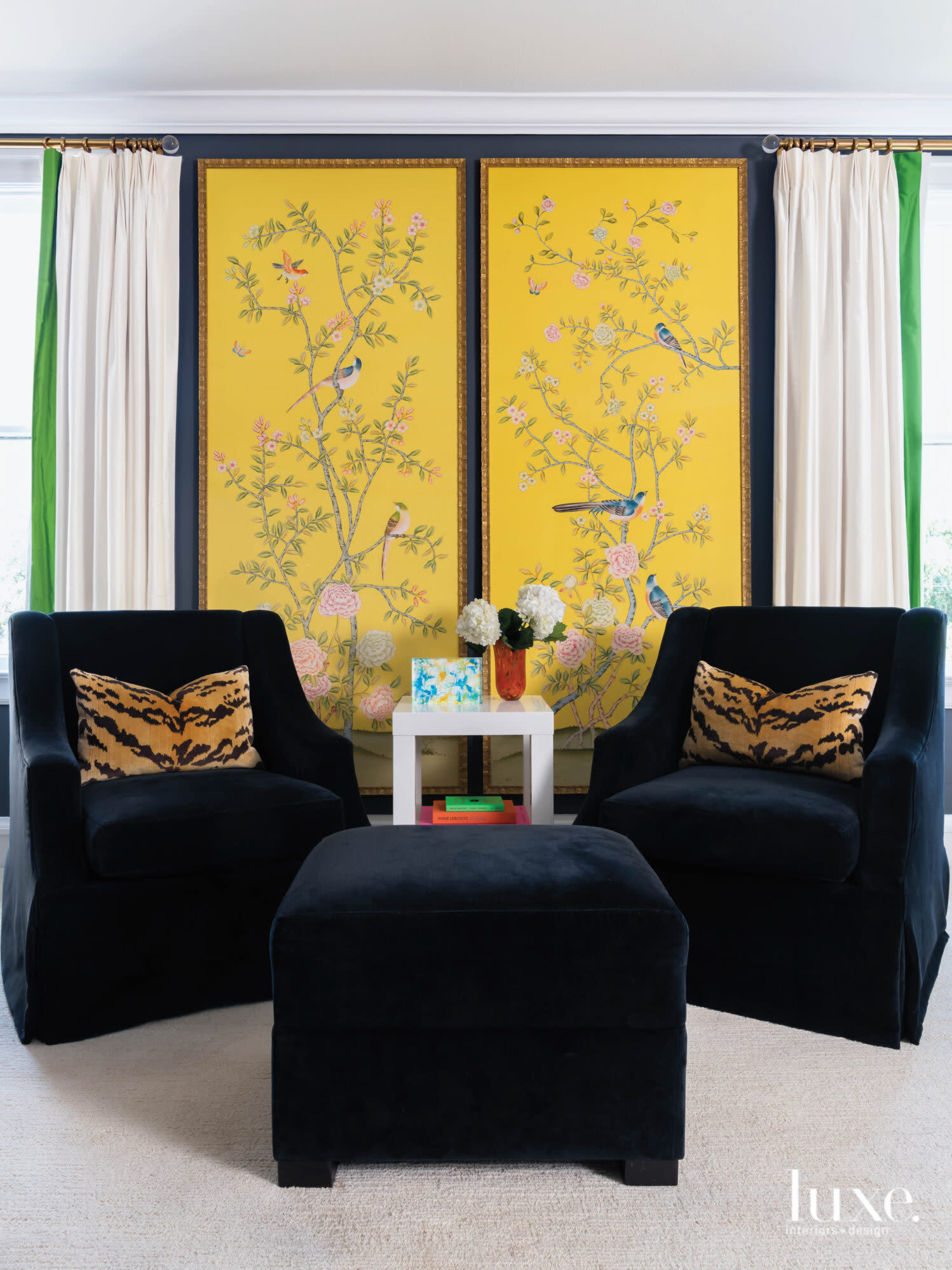 Master bedroom seating area with a yellow panel backdrop