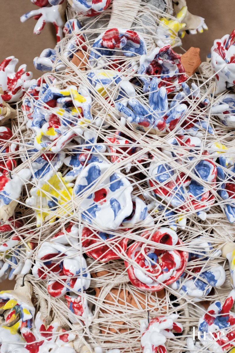 William O’Brien has a stacked layer of plaster, yarn and felt
