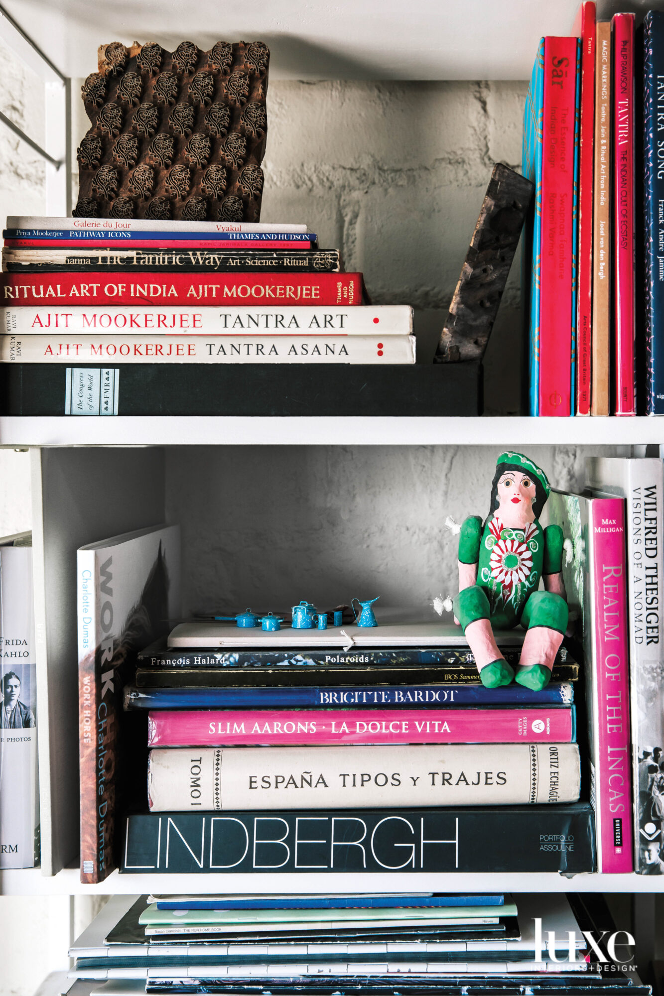 Detail of shelf with books and notable items