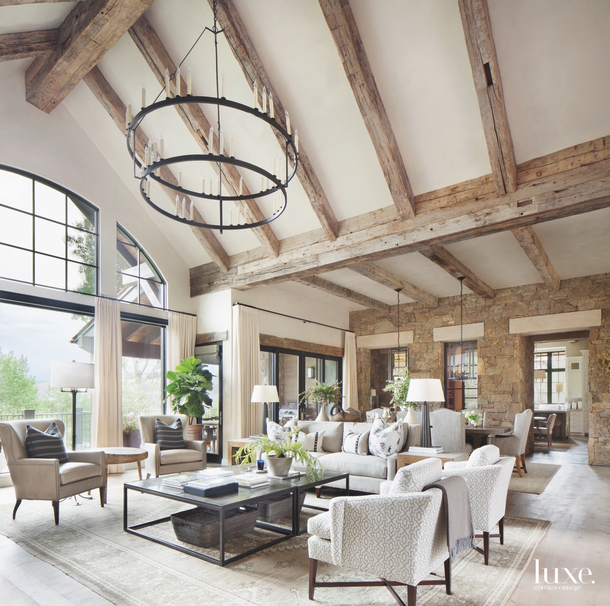 transitional living room iron chandelier metal coffee tables Iverson