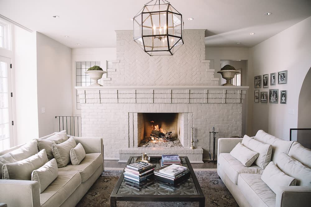 white living room with built-in masonry fireplace manufactured by FireRock in Alabama