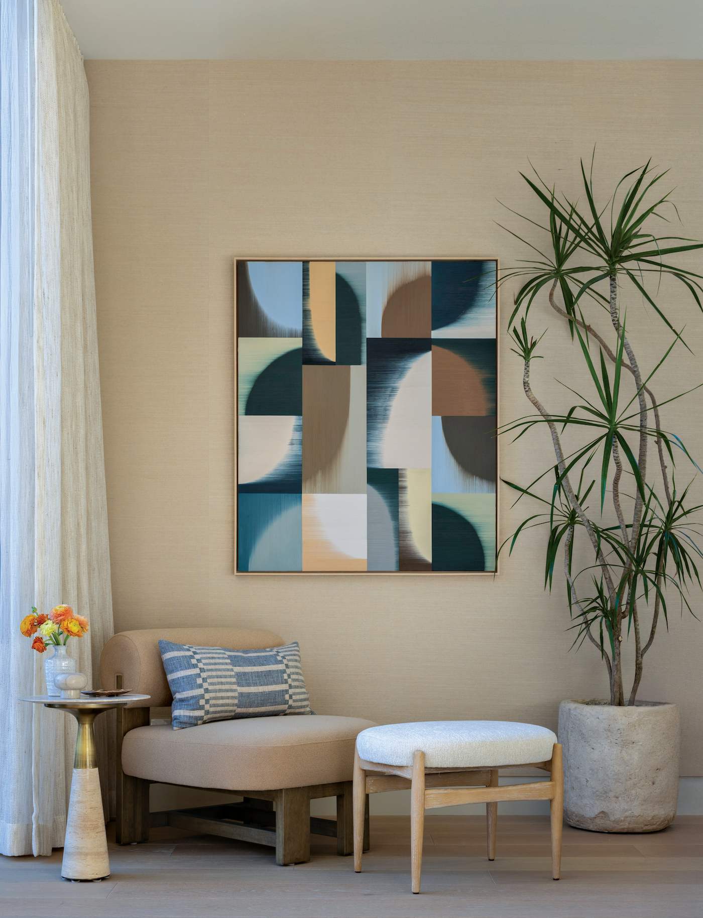 A painting by Jeff Peters was chosen with intention to add a touch of color that warmly welcomes guests upon entry.