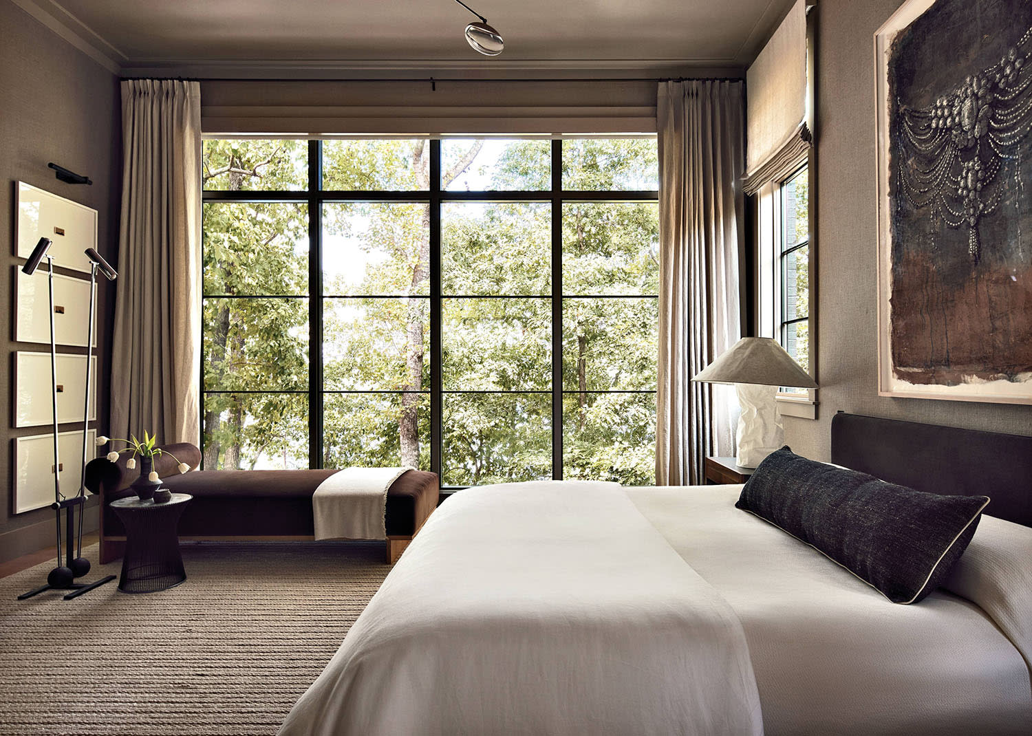 cozy, neutral bedroom in a contemporary Georgia lake house