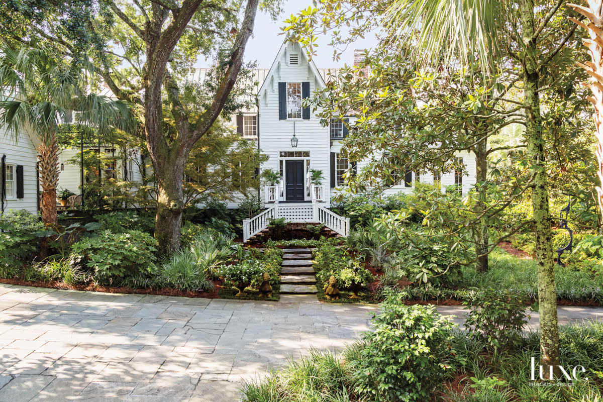 antebellum home exterior surrounded lush landscape