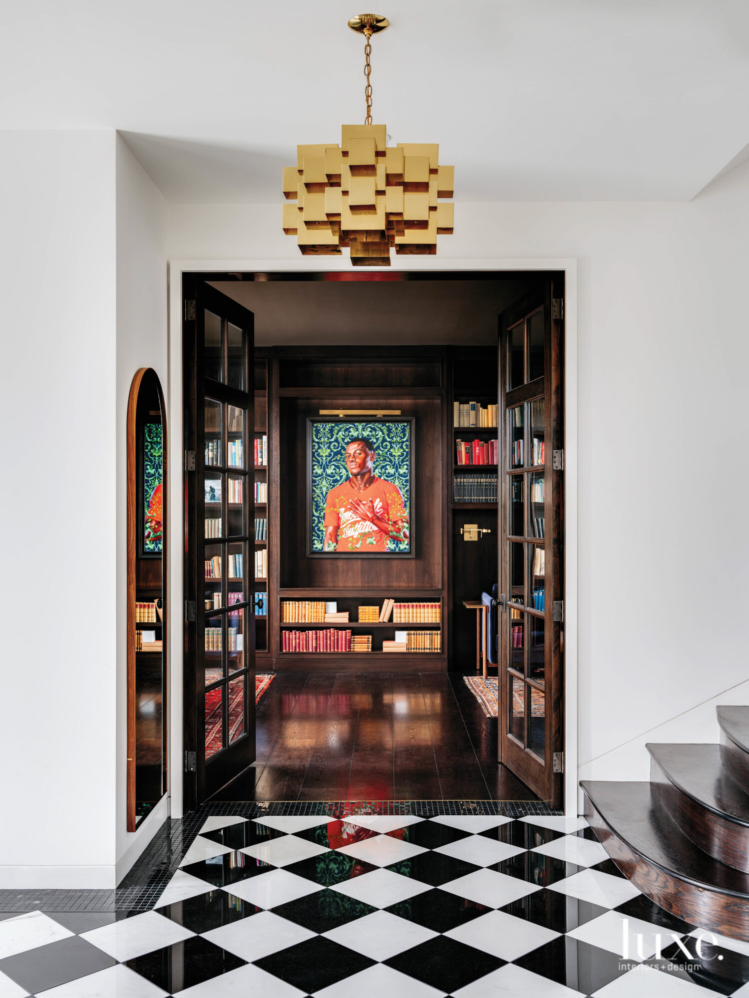 A glimpse into the library shows a brightly colored painting.