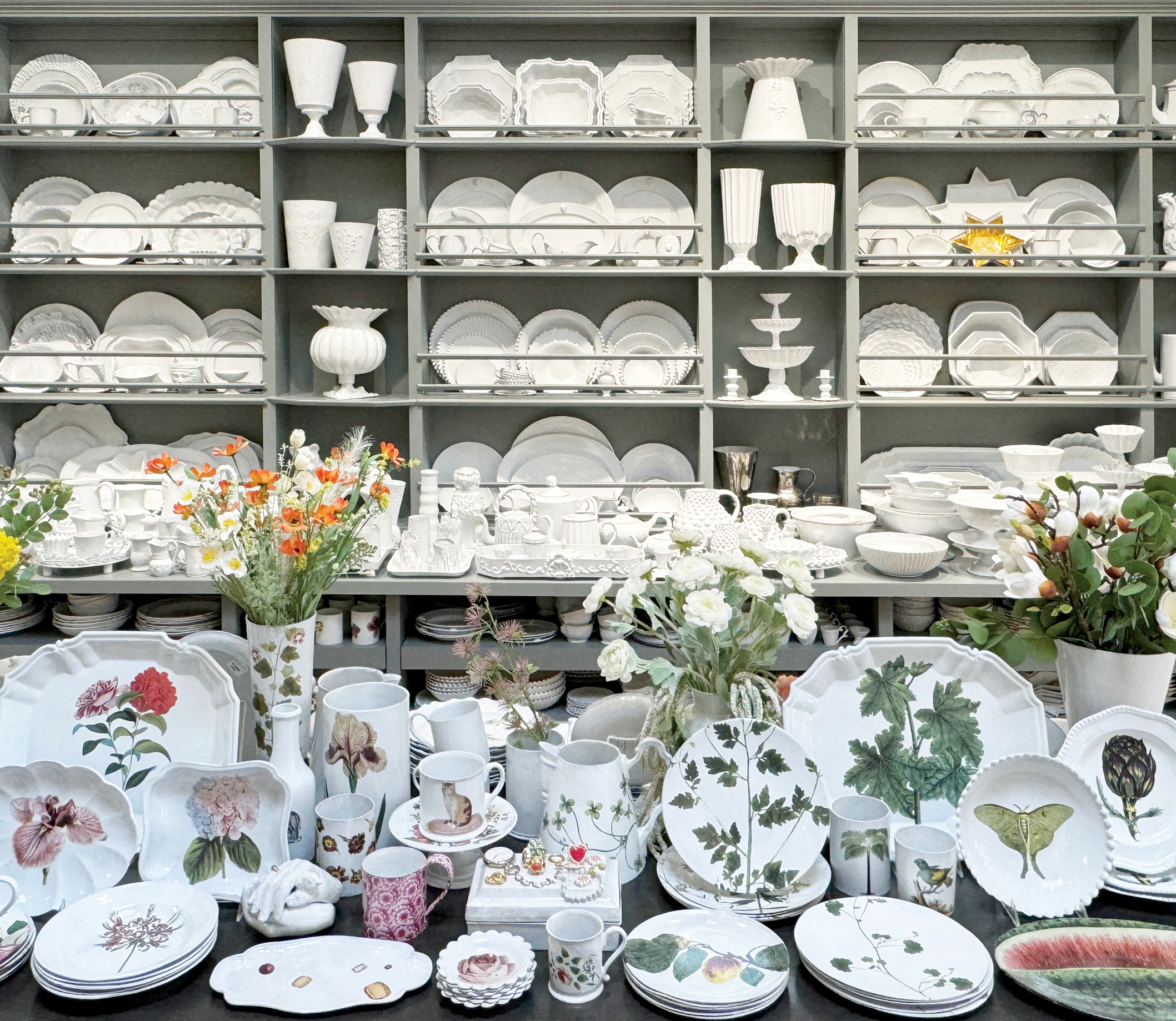 an assortment of delicate tableware on display at Sue King Fisher