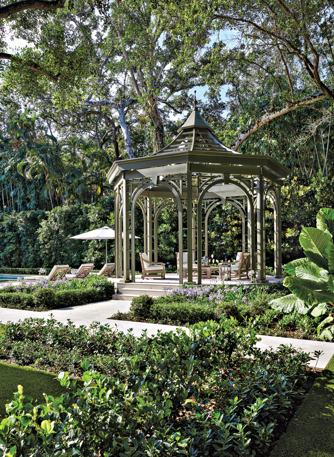 French-style pavilion among lush landscaping