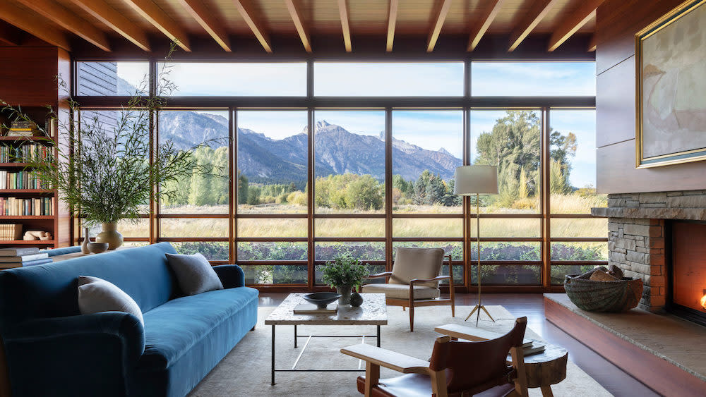 Sitting room with floor to ceiling windows and stunning views