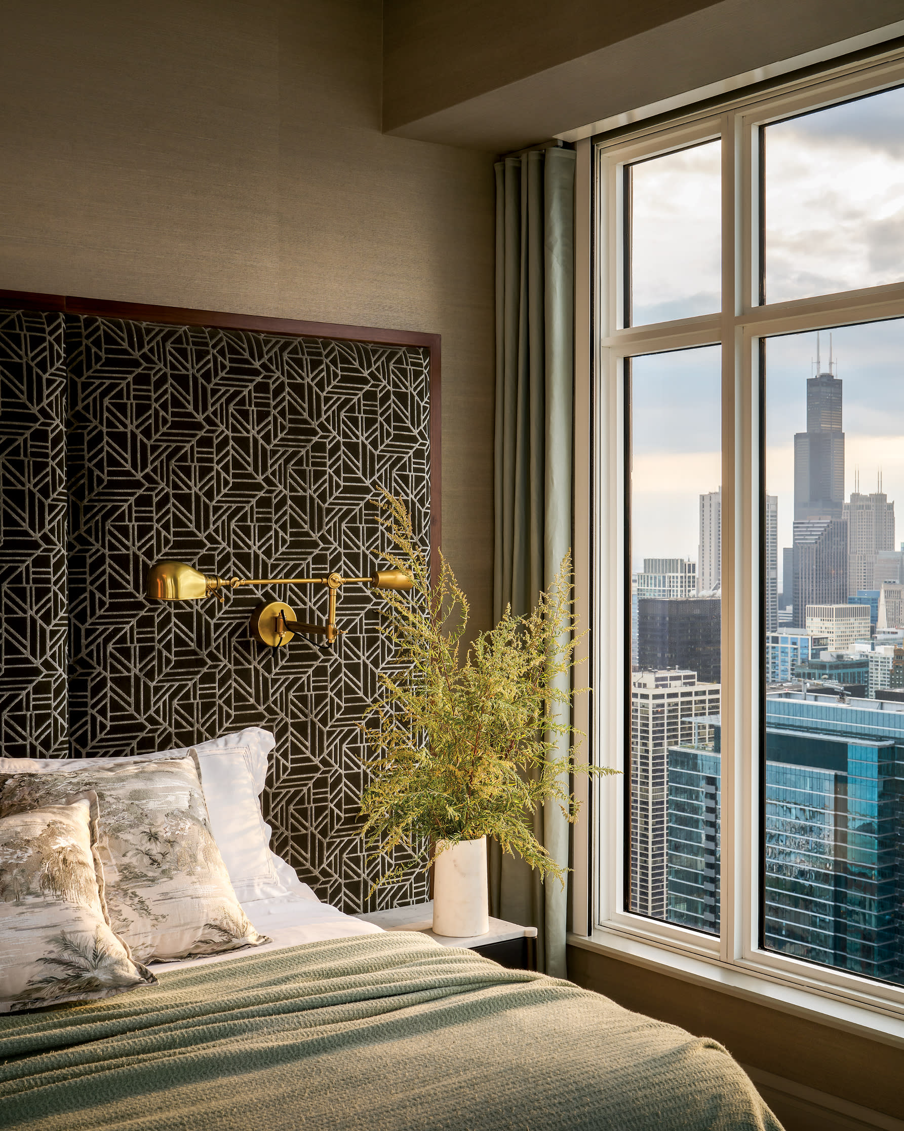 a headboard with an Art Deco style print in a Chicago high rise