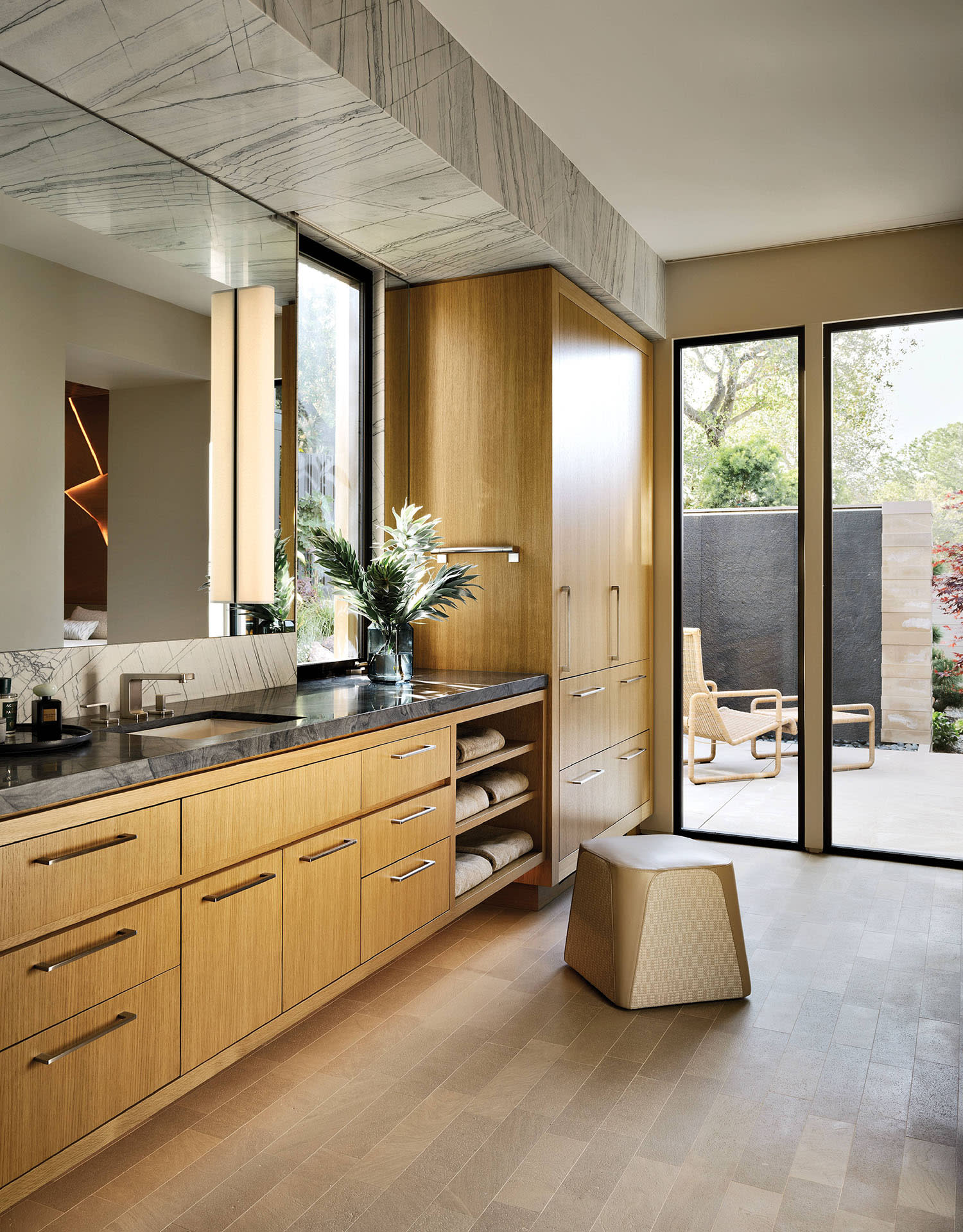 modern bathroom with a light wood vanity