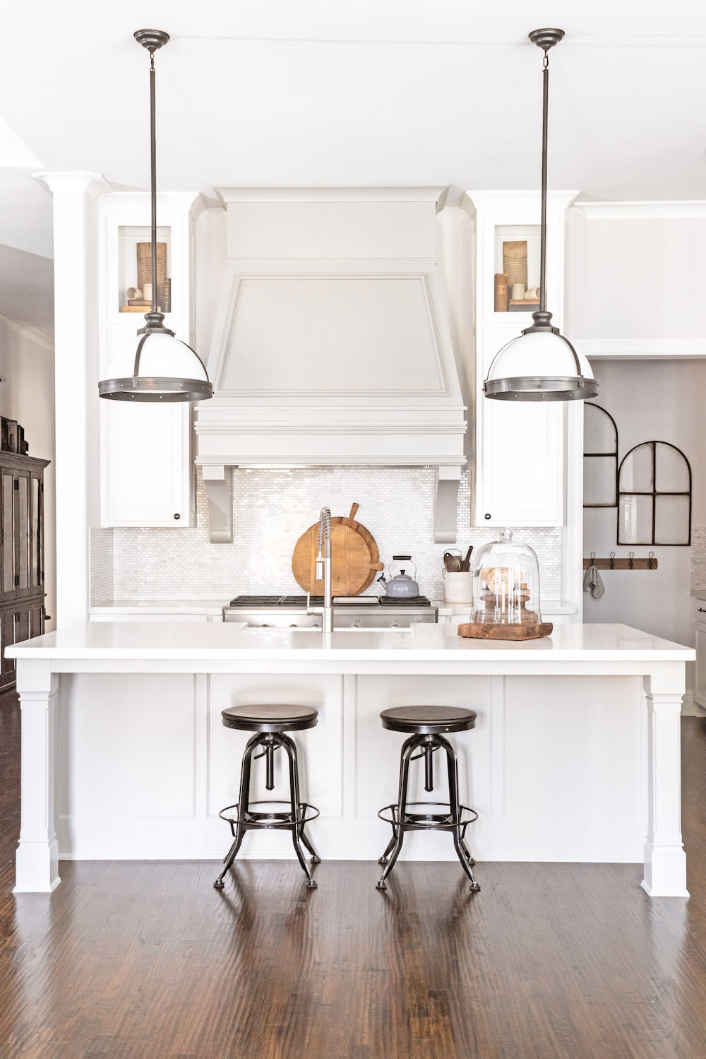 Warm wood accessories create just the pop of color and personality needed to bring this kitchen vignette to life.