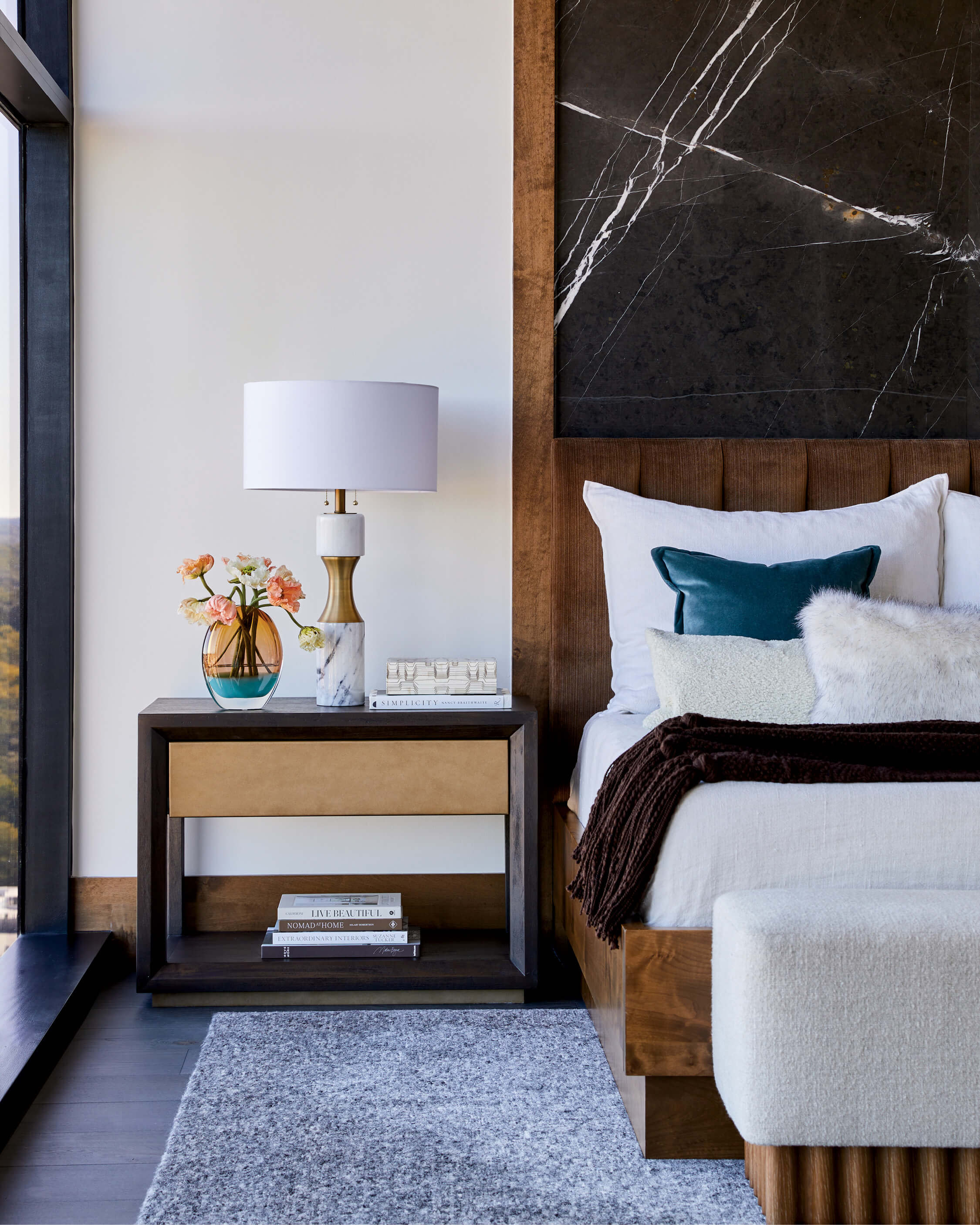 cozy and classic bedroom with a dark wood bed