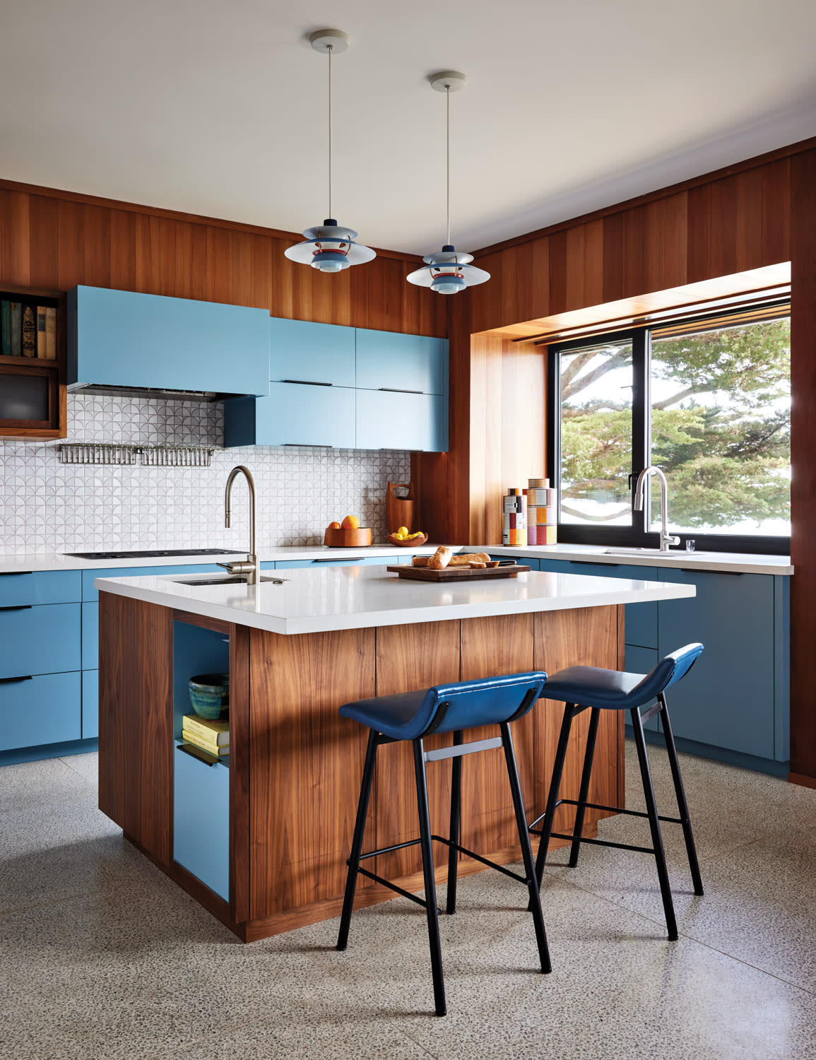 midcentury modern kitchen with blue and wood cabinetry