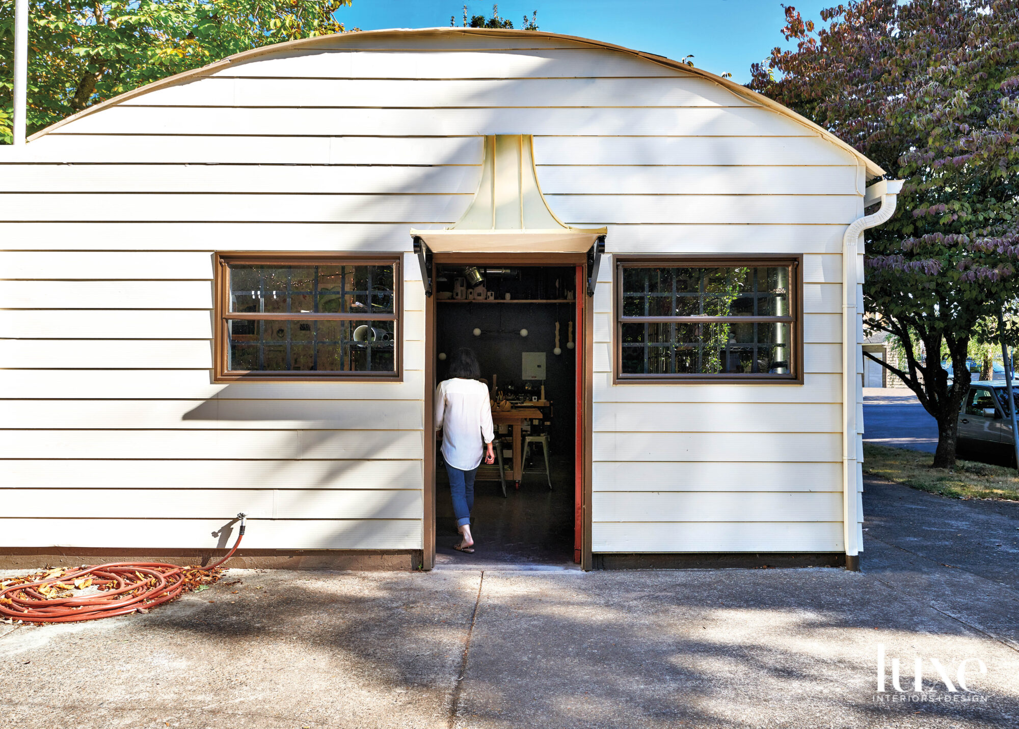 Jenny Poston walks into her Quonset hut studio in Southeast Portland