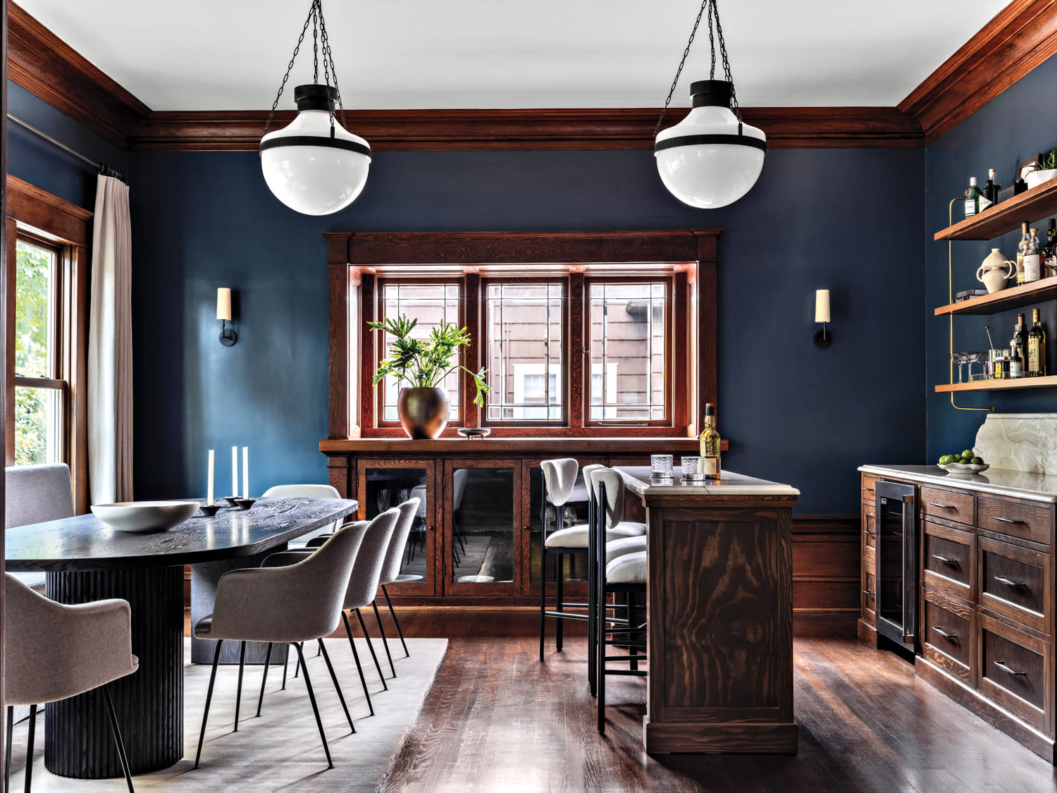 dark blue dining room with wood accents