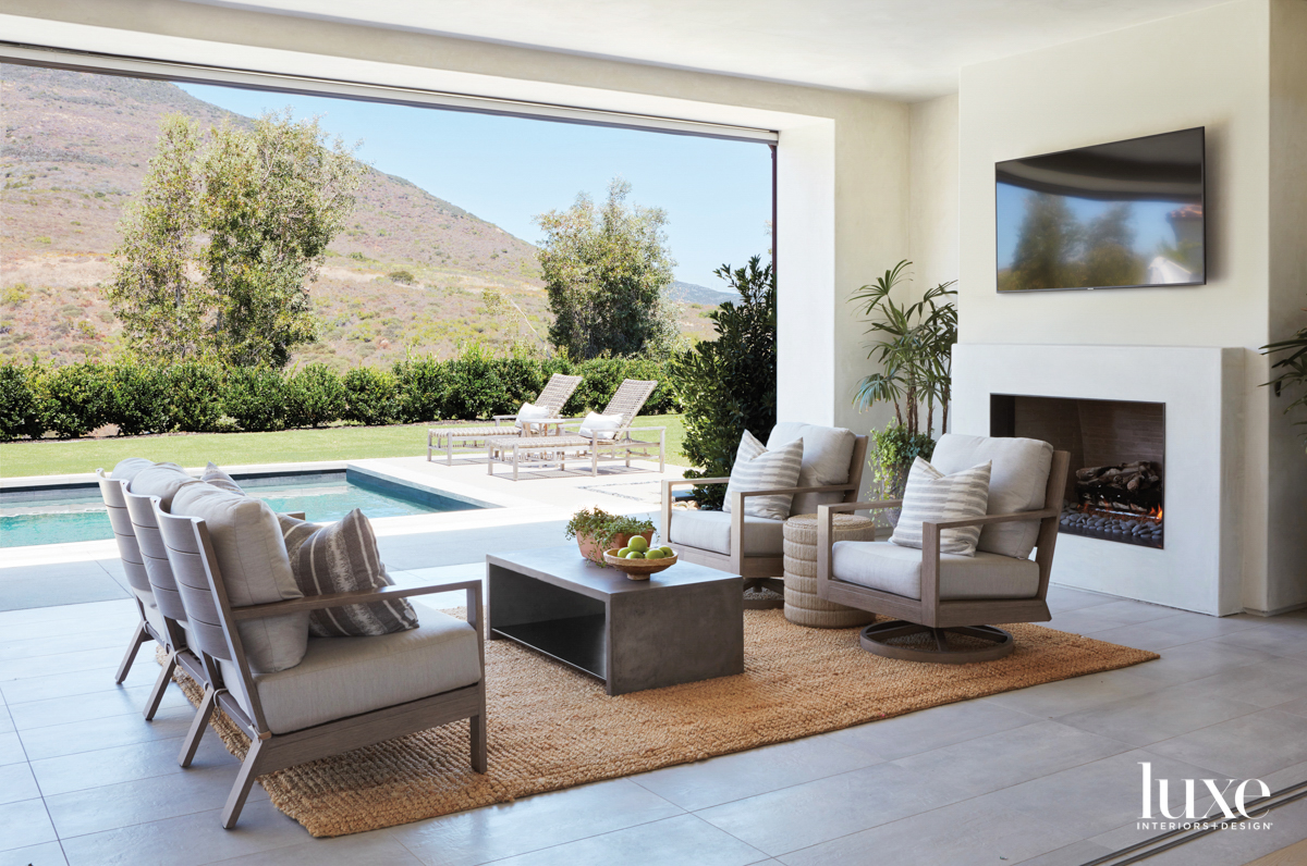 Covered outdoor room facing pool