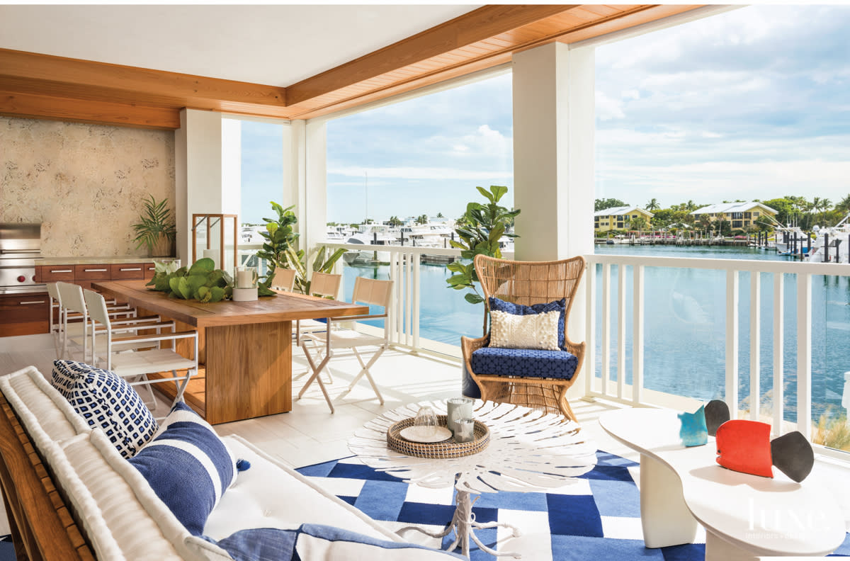 balcony with dining table and lounge chair