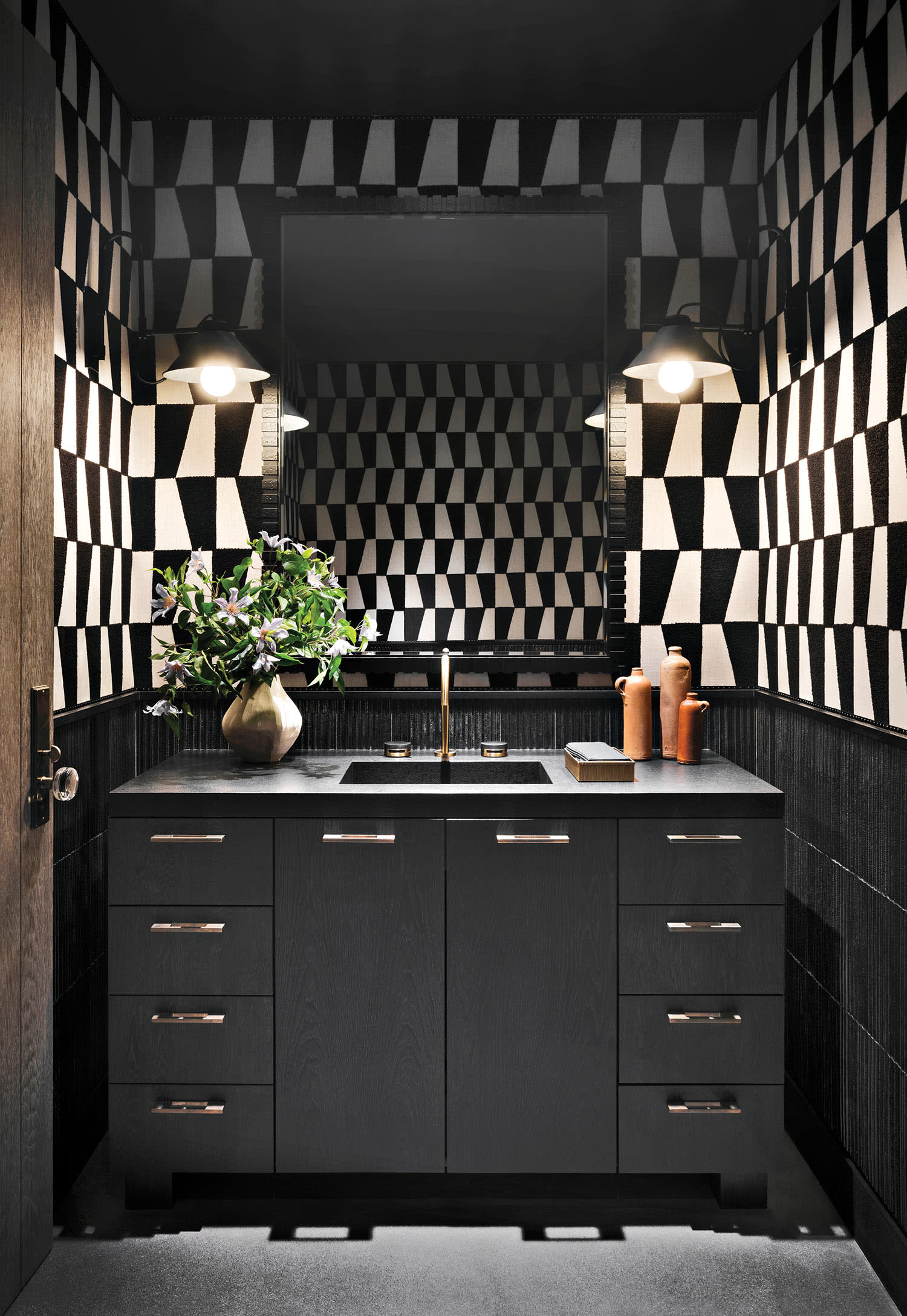 black and white powder room with a graphic Pindler textile used as a wallcovering