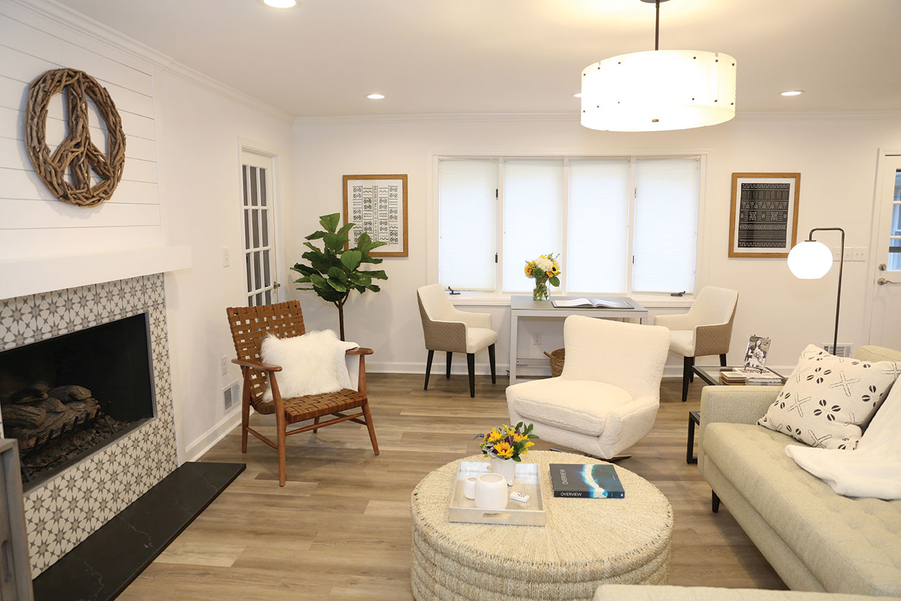 neutral living room with ottoman