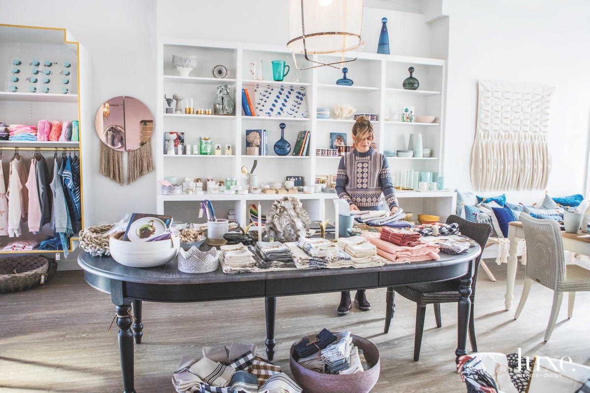 Dory Pratt's new Denver shop, Homebody, offers a stylish selection of curated items from around the globe. A canvas sculpture by Los Angeles artist Mary Little hangs on the wall, while colorful glass Reflection Bottles by Gary Bodker Designs in Portland, Oregon, are among the pieces that dot the shelves.